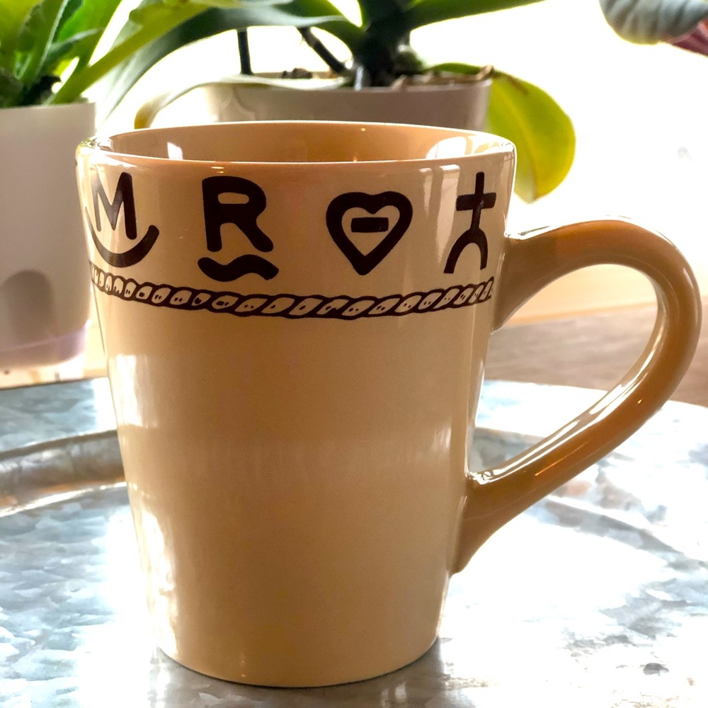 Set of four (4) WC Branded coffee mugs.